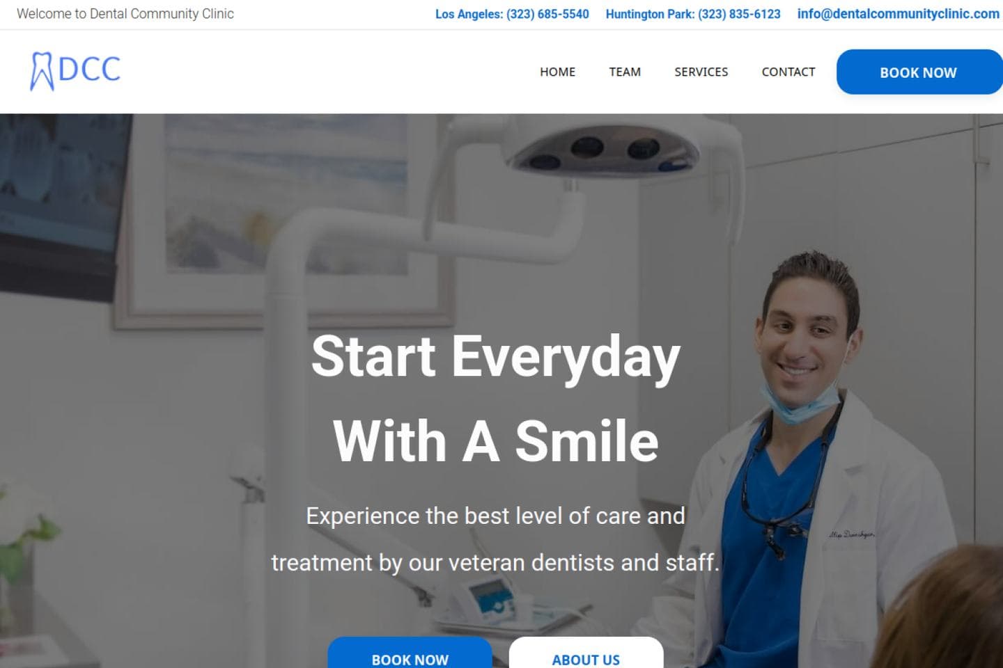 Dental Community Clinic homepage with a smiling dentist and booking buttons